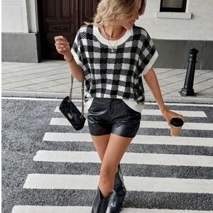 Black and white houndstooth oversized sleeveless sweater, medium, $30.